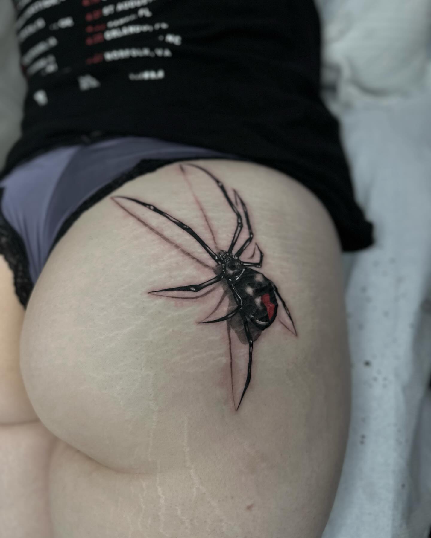 Spider realism tattoo on the thigh by Emersyn DeLuna