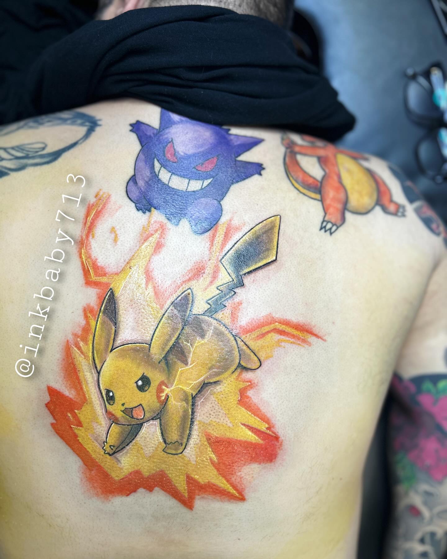 Pikachu new school tattoo on the back by Ayanna Luna