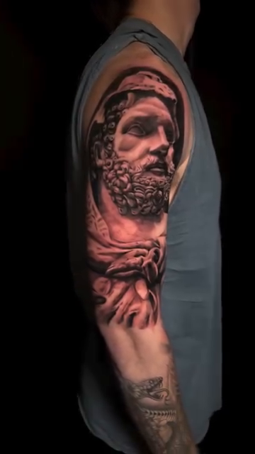 Bust of a man realism tattoo by Charlotte Tattoo Artist