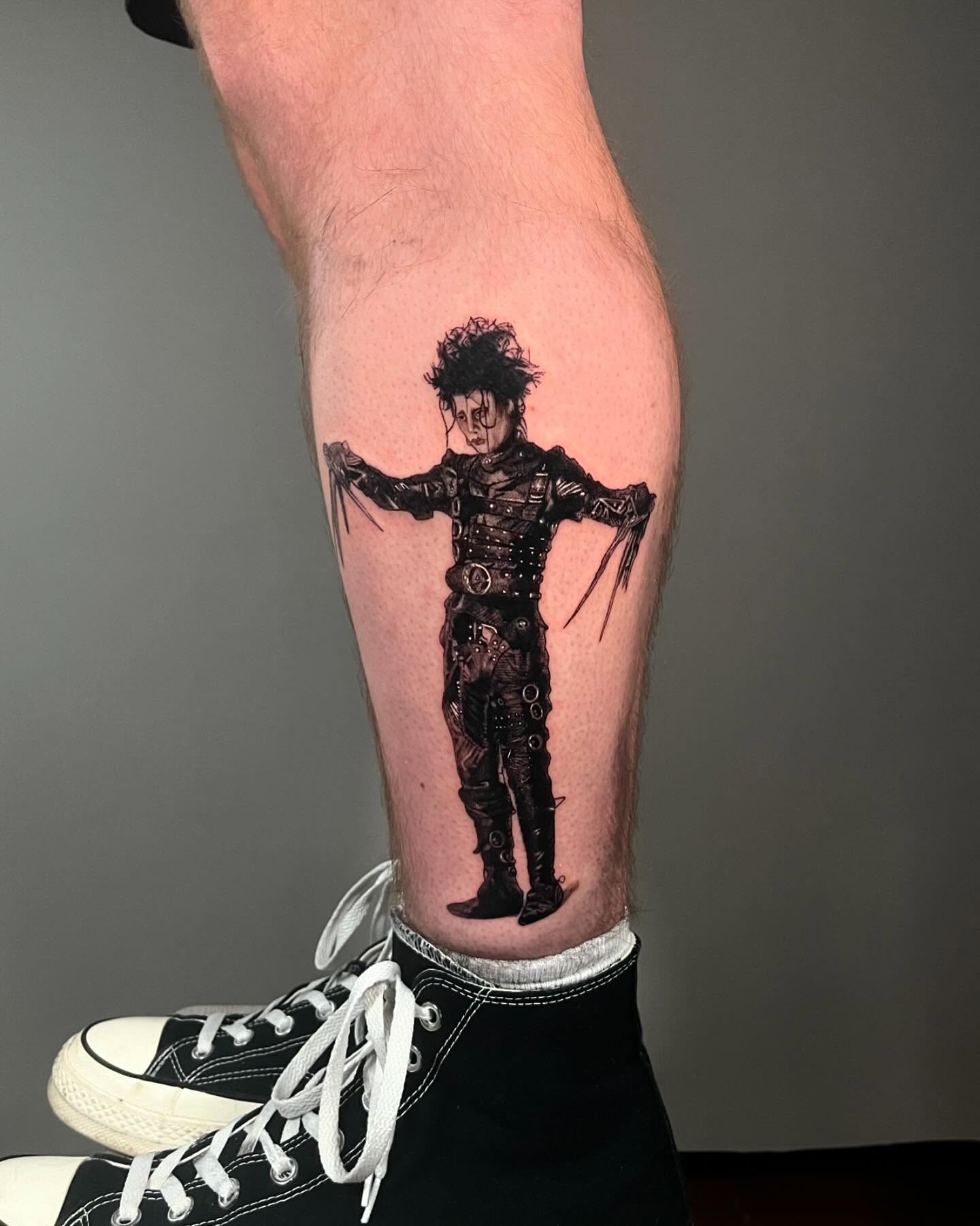 Tattoo by @jiinkytattoos — black_and_grey, realism
