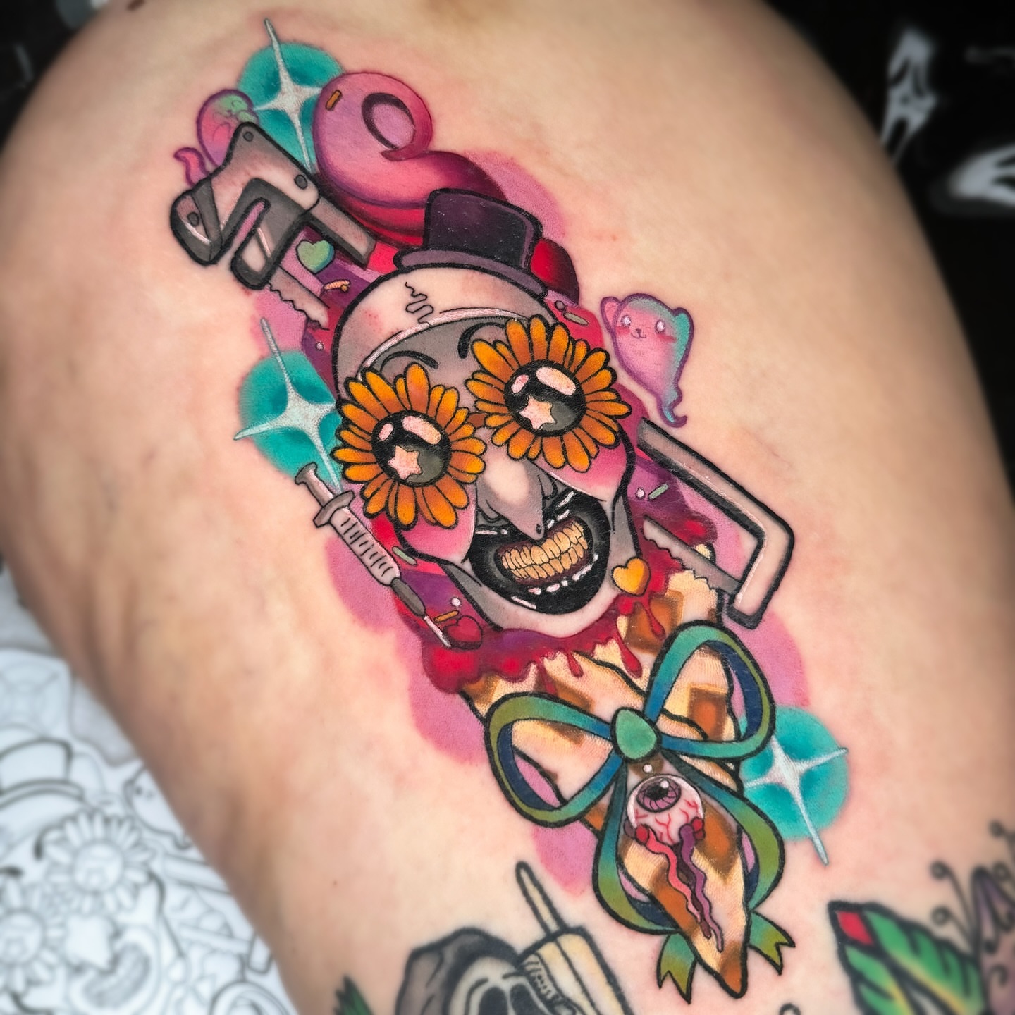 Clown with flowers American traditional tattoo on the thigh by 𝔐𝔞𝔯𝔰 ✨