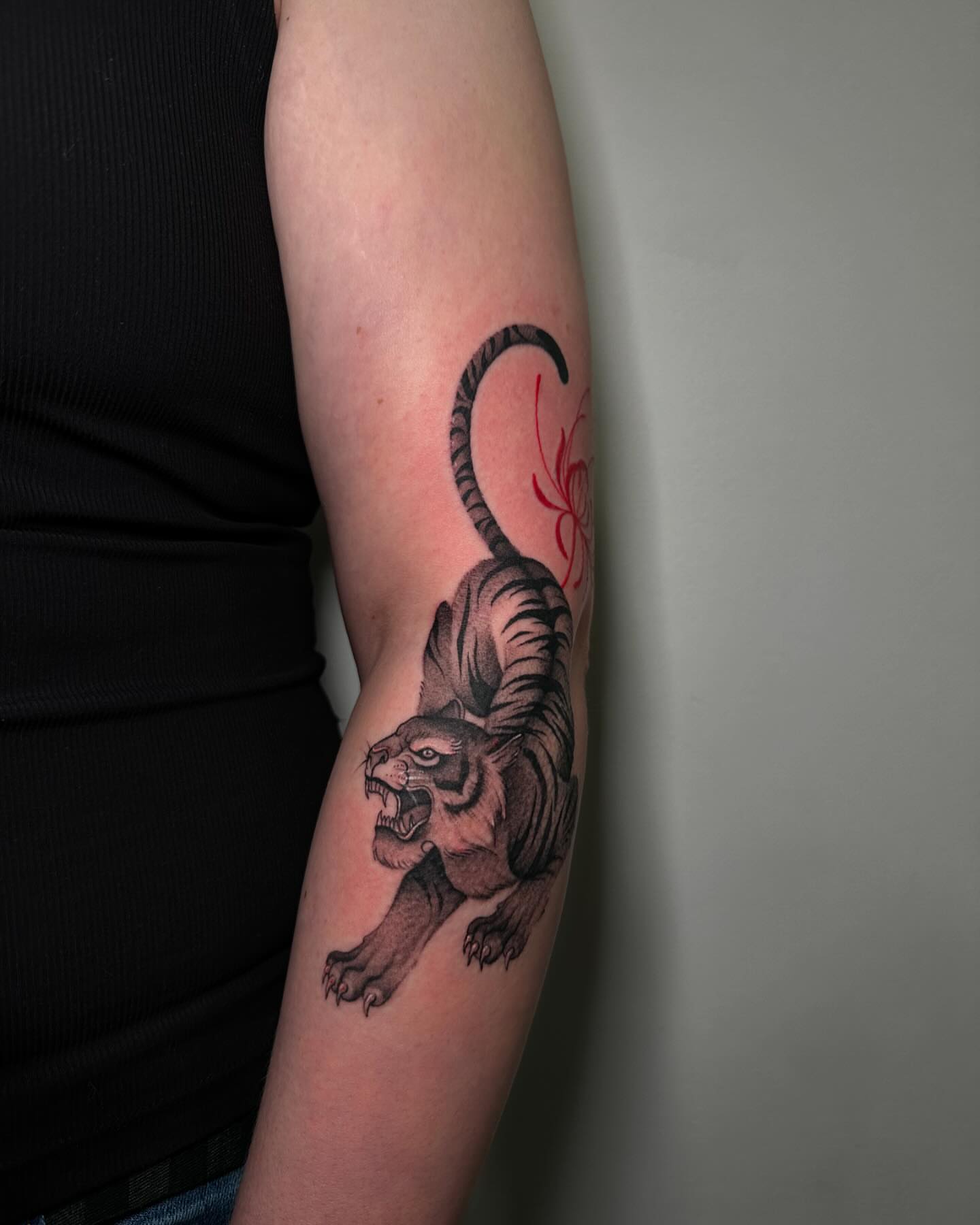 Tiger black and grey tattoo on the forearm by @piinkywabbiit, Roselle Park, New Jersey