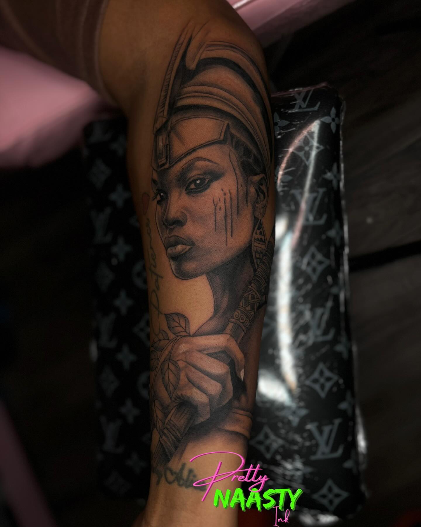 Woman with headdress realism tattoo on the forearm by Pretty Naasty Ink🖤