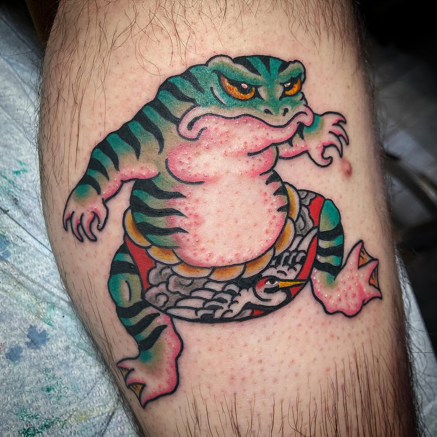 Frog American traditional tattoo on the thigh by Alex Citrone - Martha’s Vineyard Tattoo