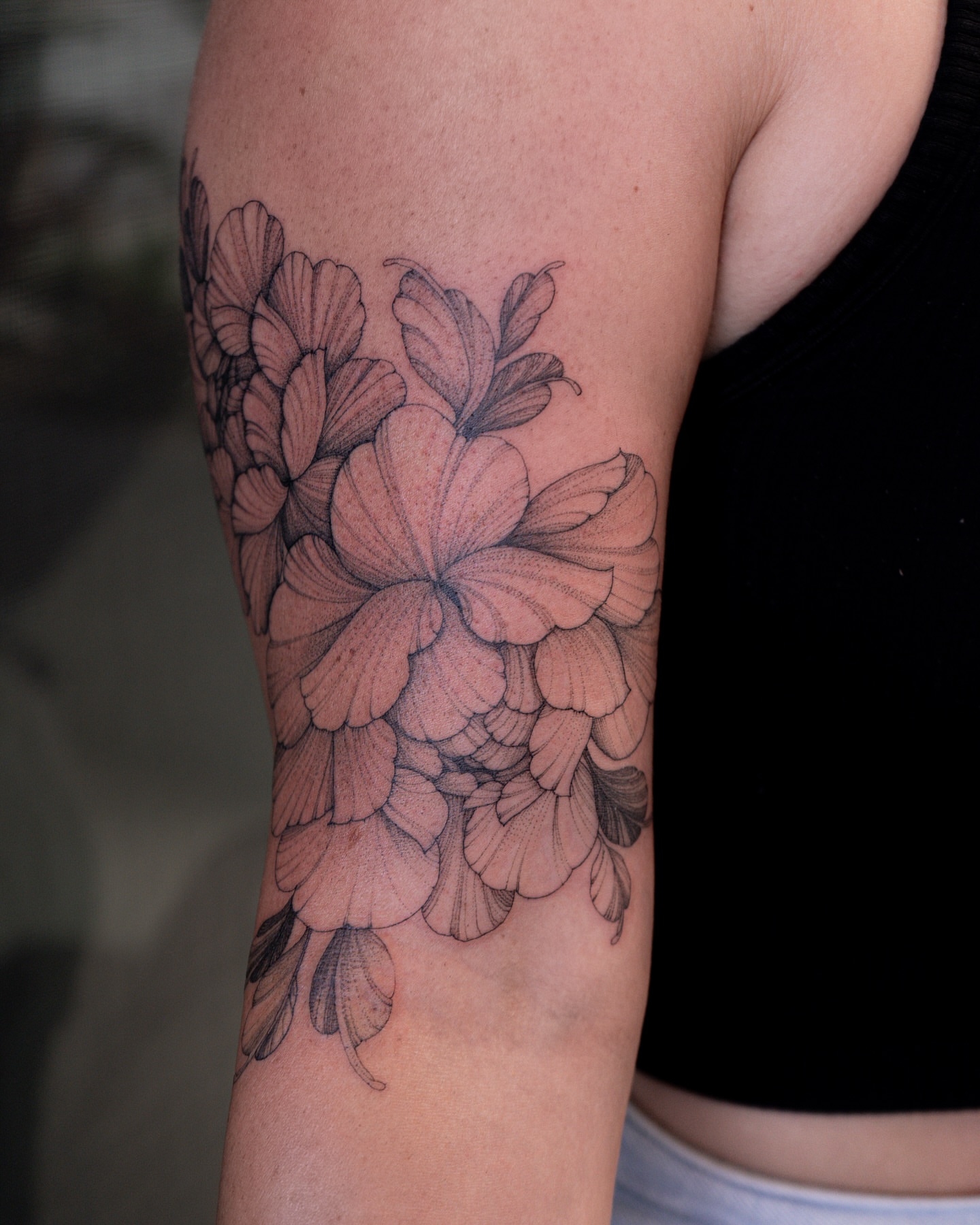 Flower bouquet dotwork tattoo on the forearm by Flower Tattoo Sf