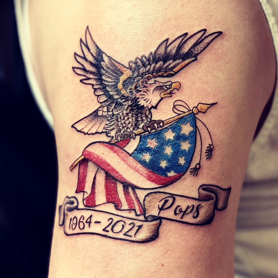 American eagle with shield American traditional tattoo on the thigh by Matthew Clanin