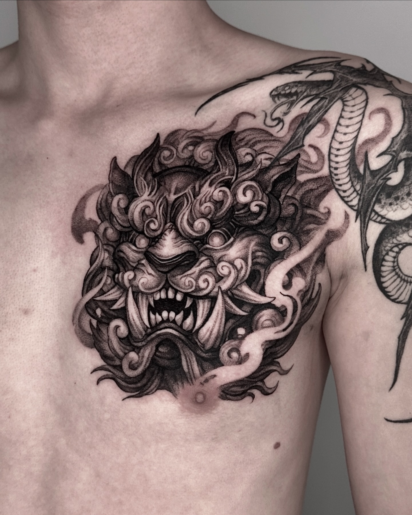 Lion japanese irezumi tattoo on the chest by 두식