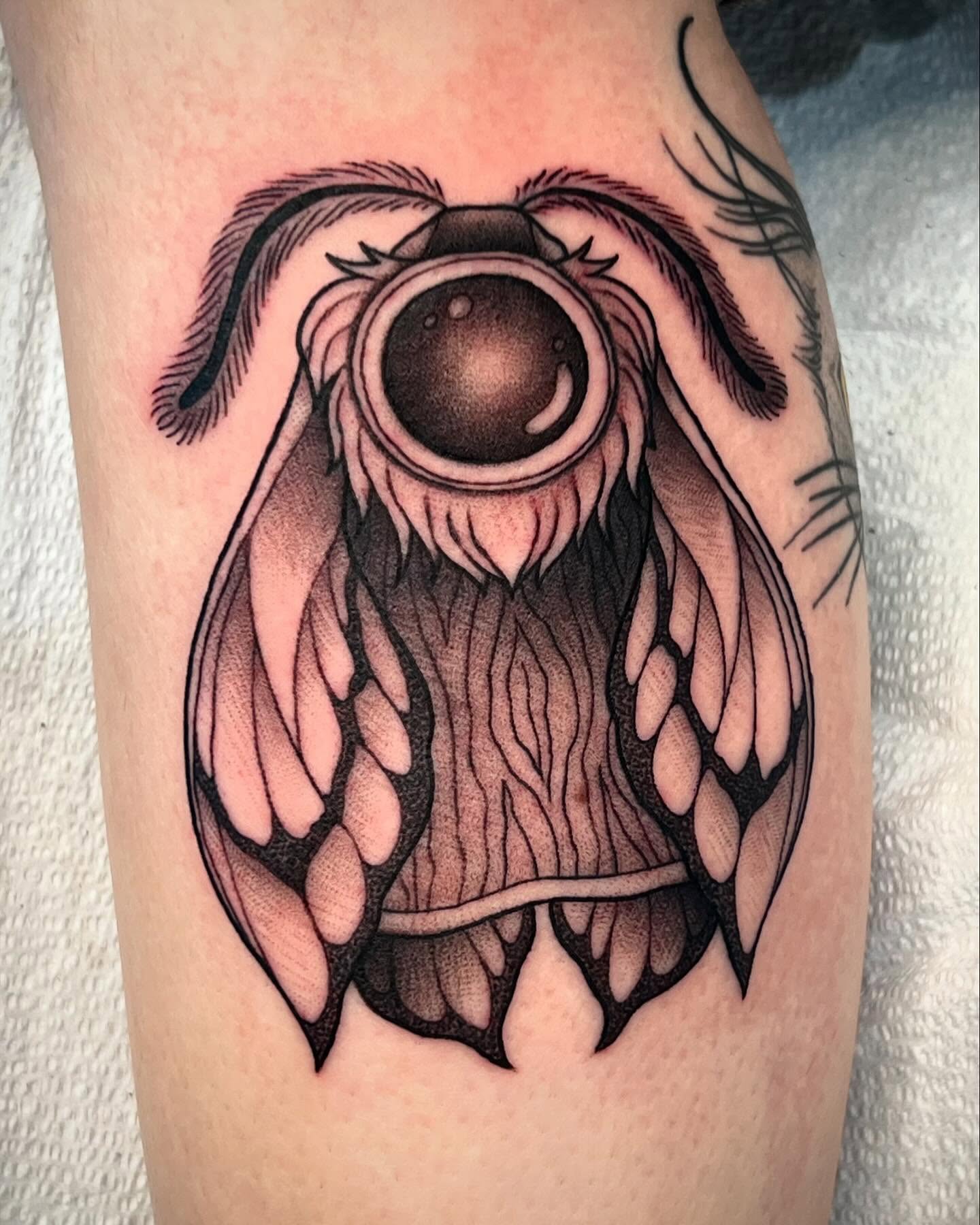 Owl black and grey tattoo on the forearm by Mia Manzanedo