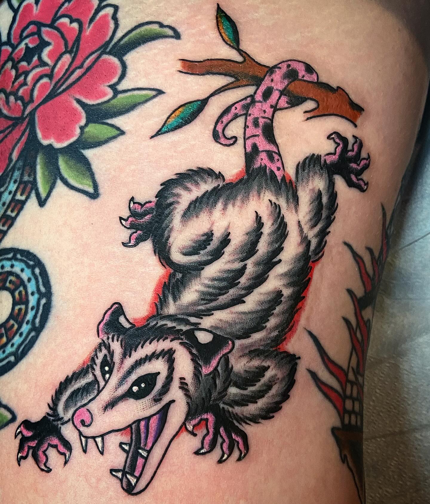 Badger and dragon American traditional tattoo on the thigh by Alex Citrone - Martha’s Vineyard Tattoo
