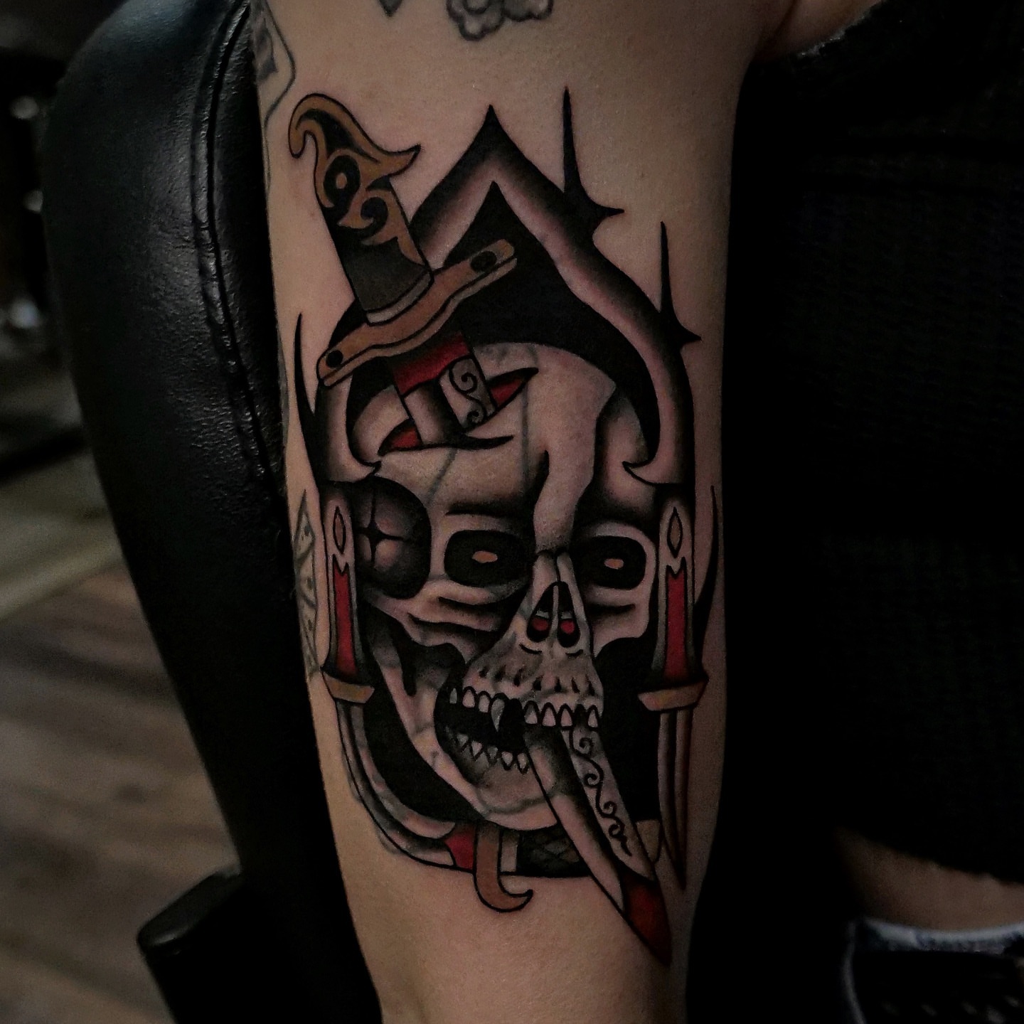 Skull with top hat American traditional tattoo on the forearm by Brandon Murphy