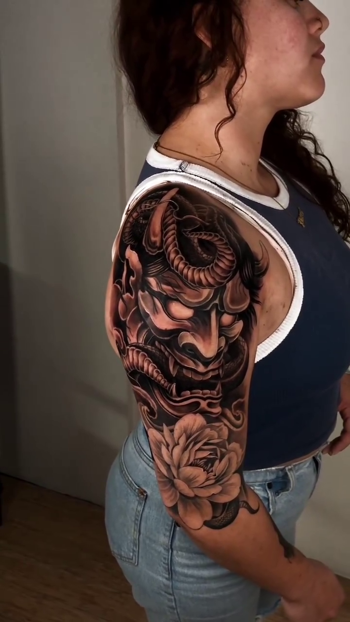 Demon mask and rose dark realism tattoo by David "Mager" Torres