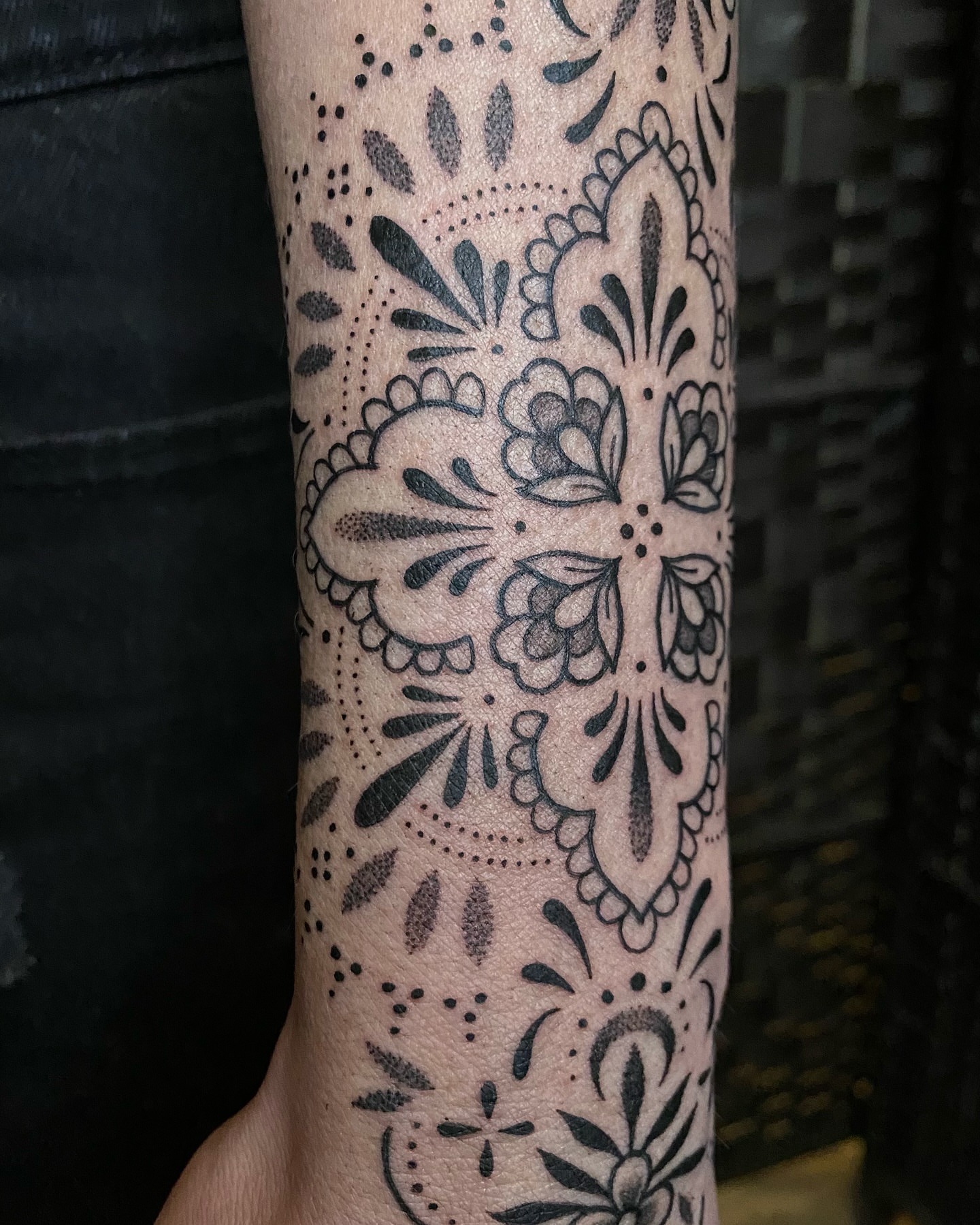 Sugar skull dotwork tattoo on the forearm by Rose Ulinski