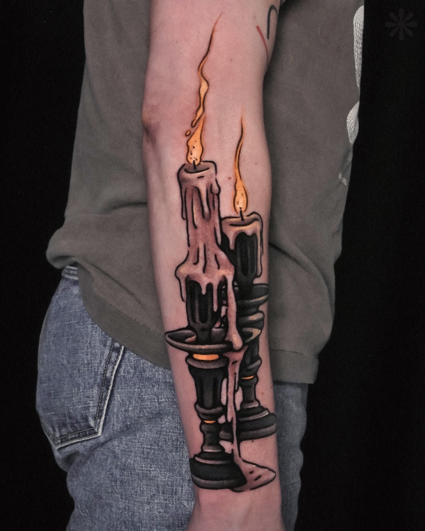 Candlesticks realism tattoo on the forearm by Last Year Of Disaster