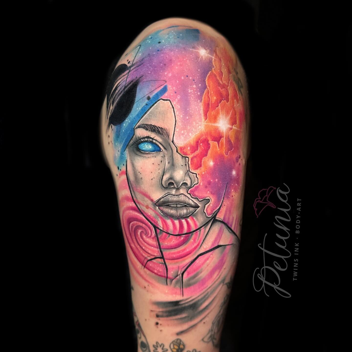 Galactic woman watercolor tattoo on the forearm by Alena Petunia