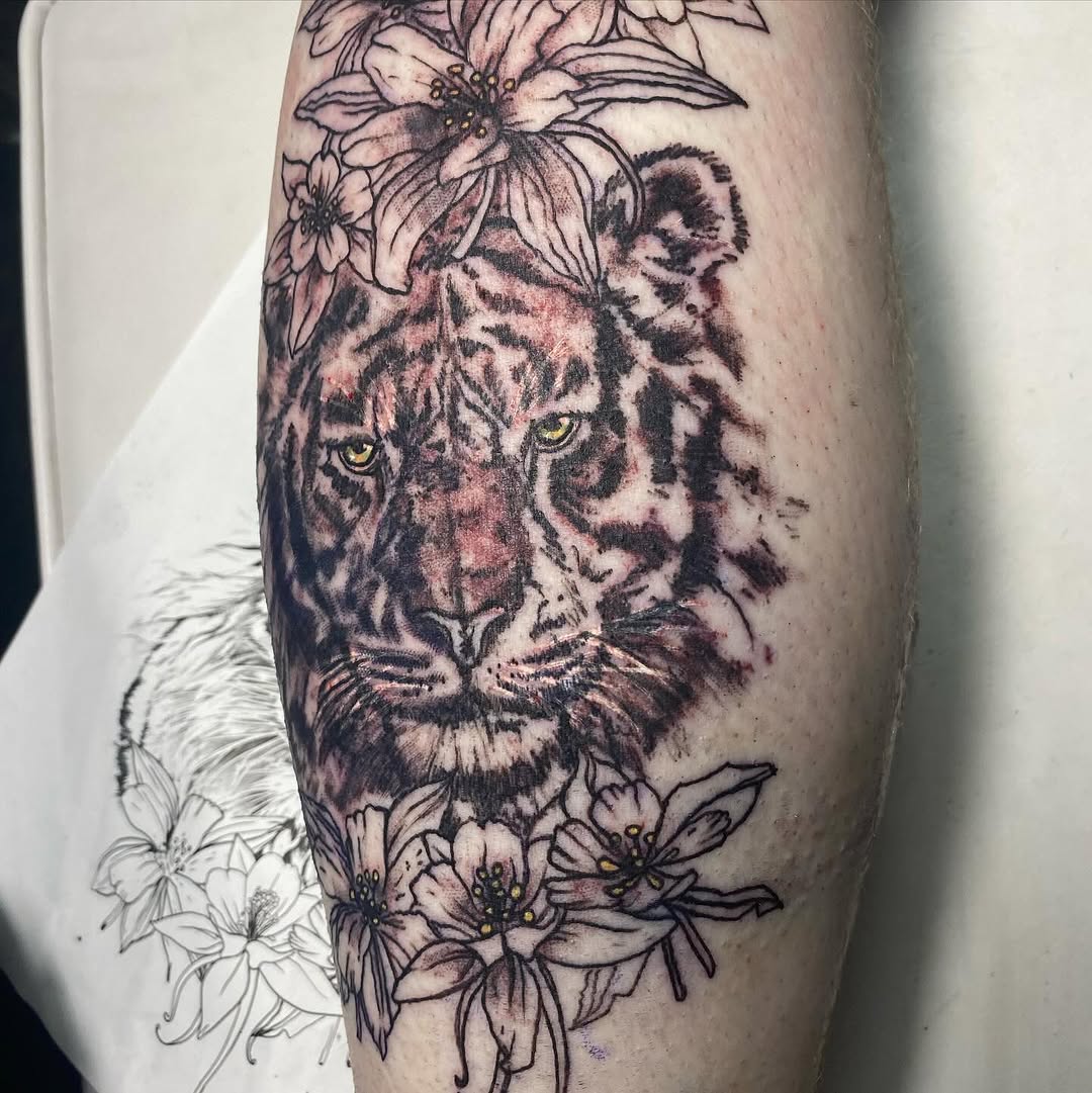 Tiger face with flowers realism tattoo on the forearm by MD Ariel🦷