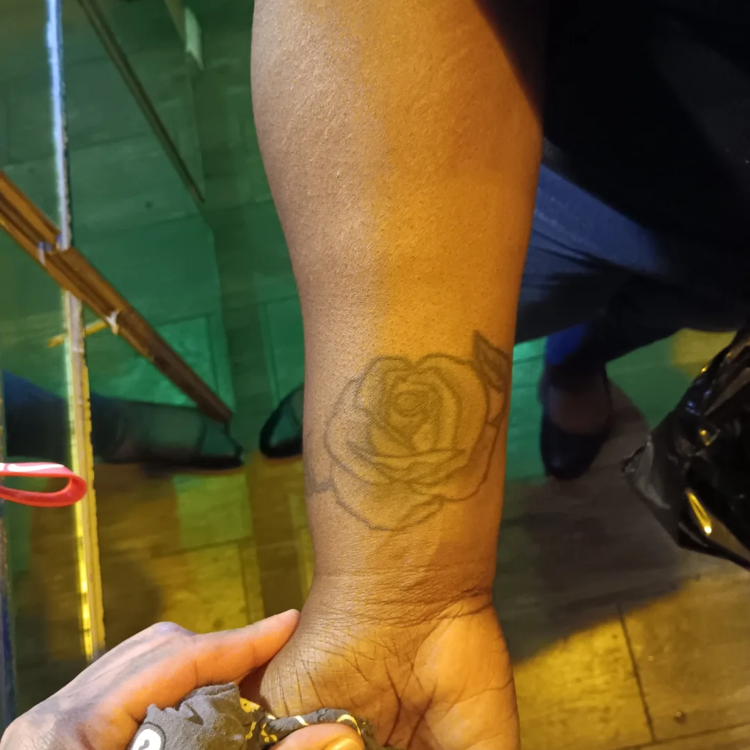 Rose black and grey tattoo on the forearm by Alfredo Sosa