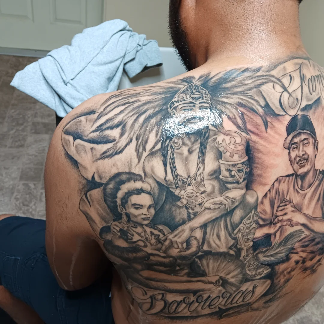 Family portrait realism tattoo on the back by Alfredo Sosa