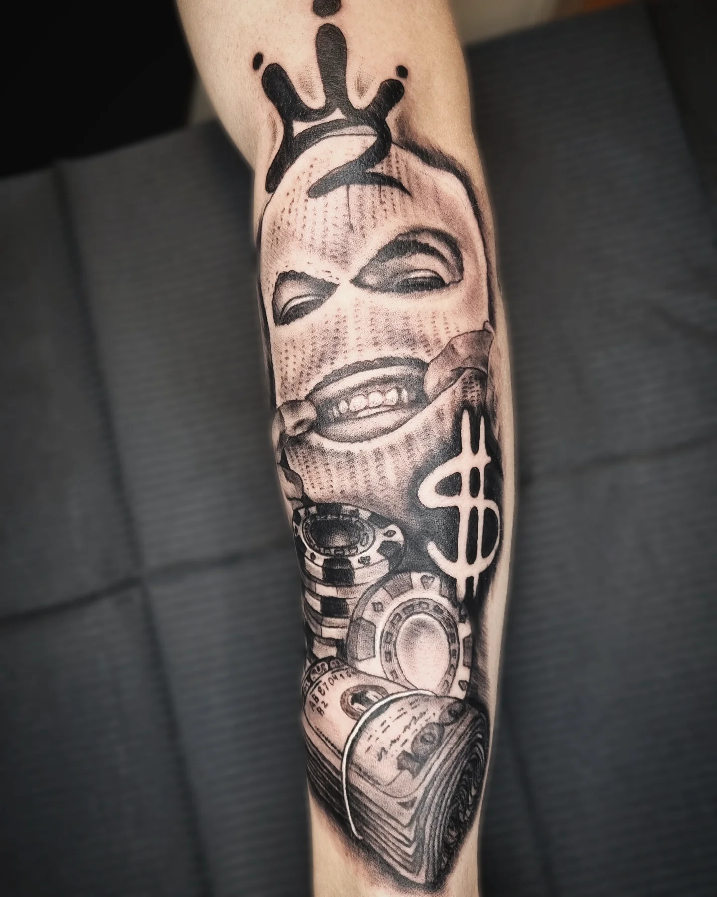 Skull with crown dotwork tattoo on the forearm by AntiheroTattoo