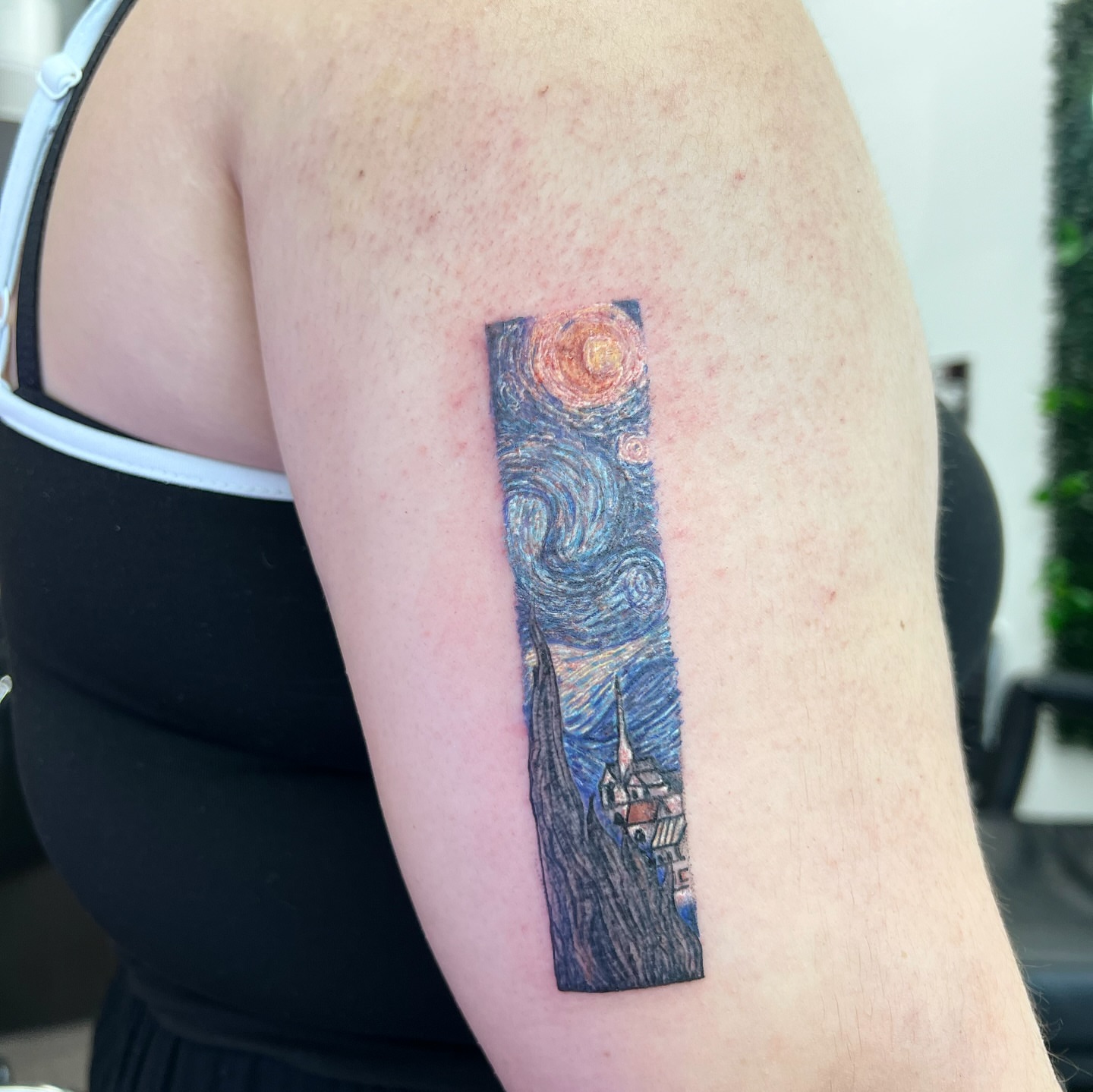 Starry night dotwork tattoo on the upper arm by Syd Cheyenne
