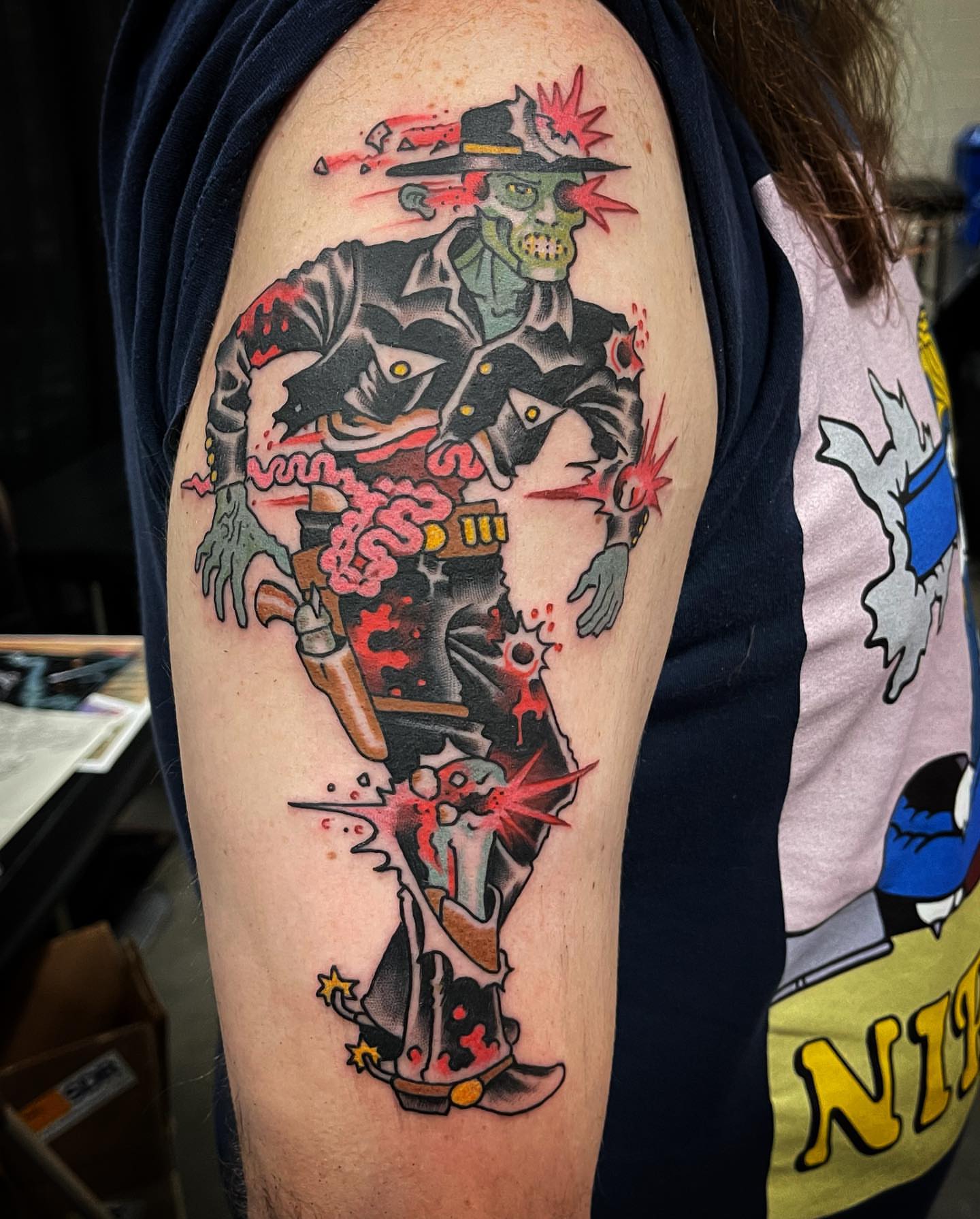 Zombie cowboy American traditional tattoo on the upper arm by Ian Bederman, Austin, Texas
