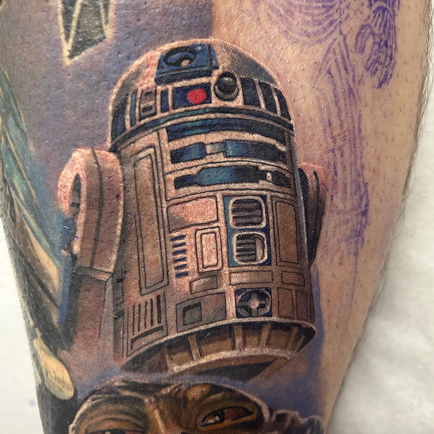 R2-D2 realism tattoo on the forearm by Adam Zgorliski_STStattoo