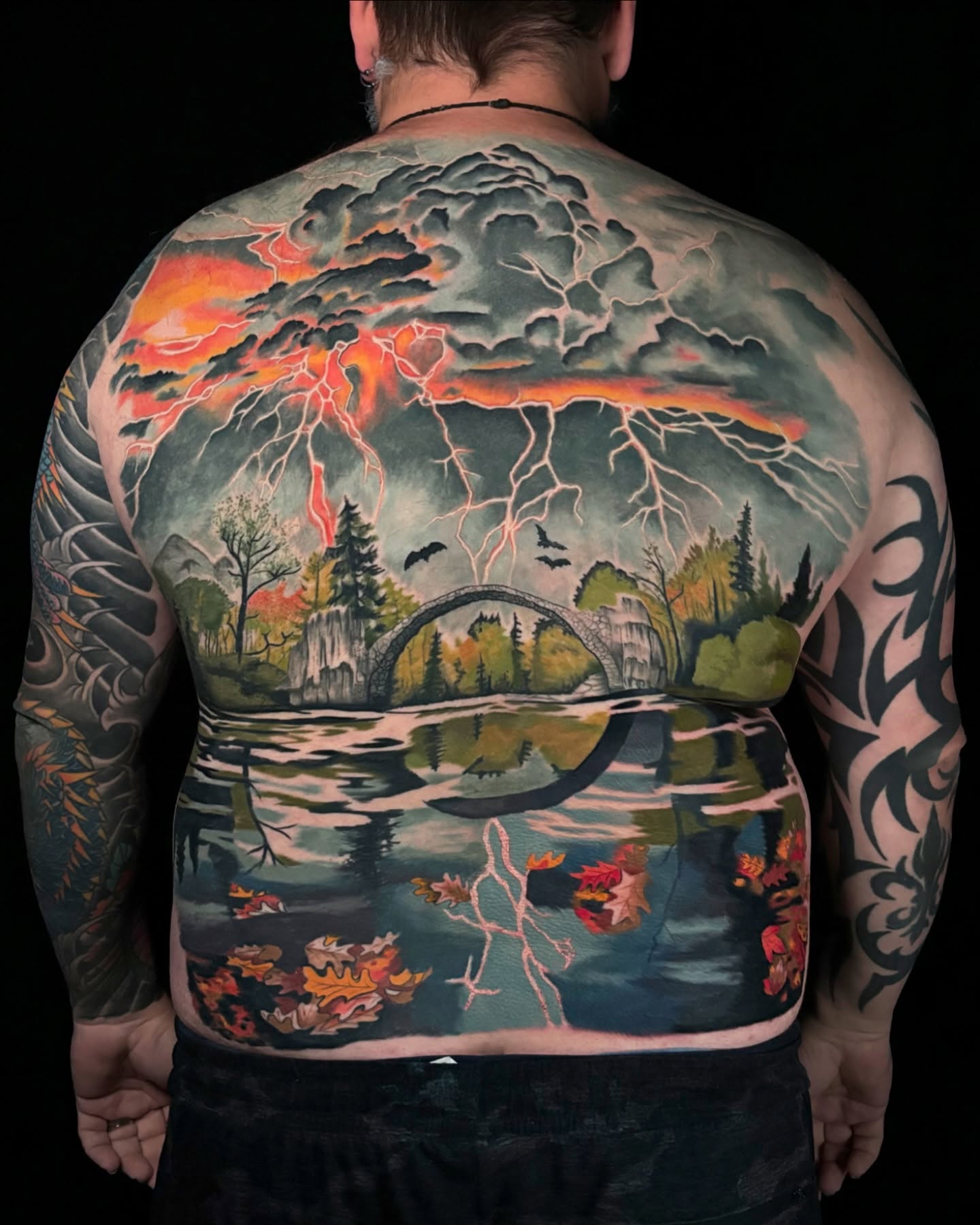 Storm landscape realism tattoo on the back by Matt Trimble, Charlotte, North Carolina