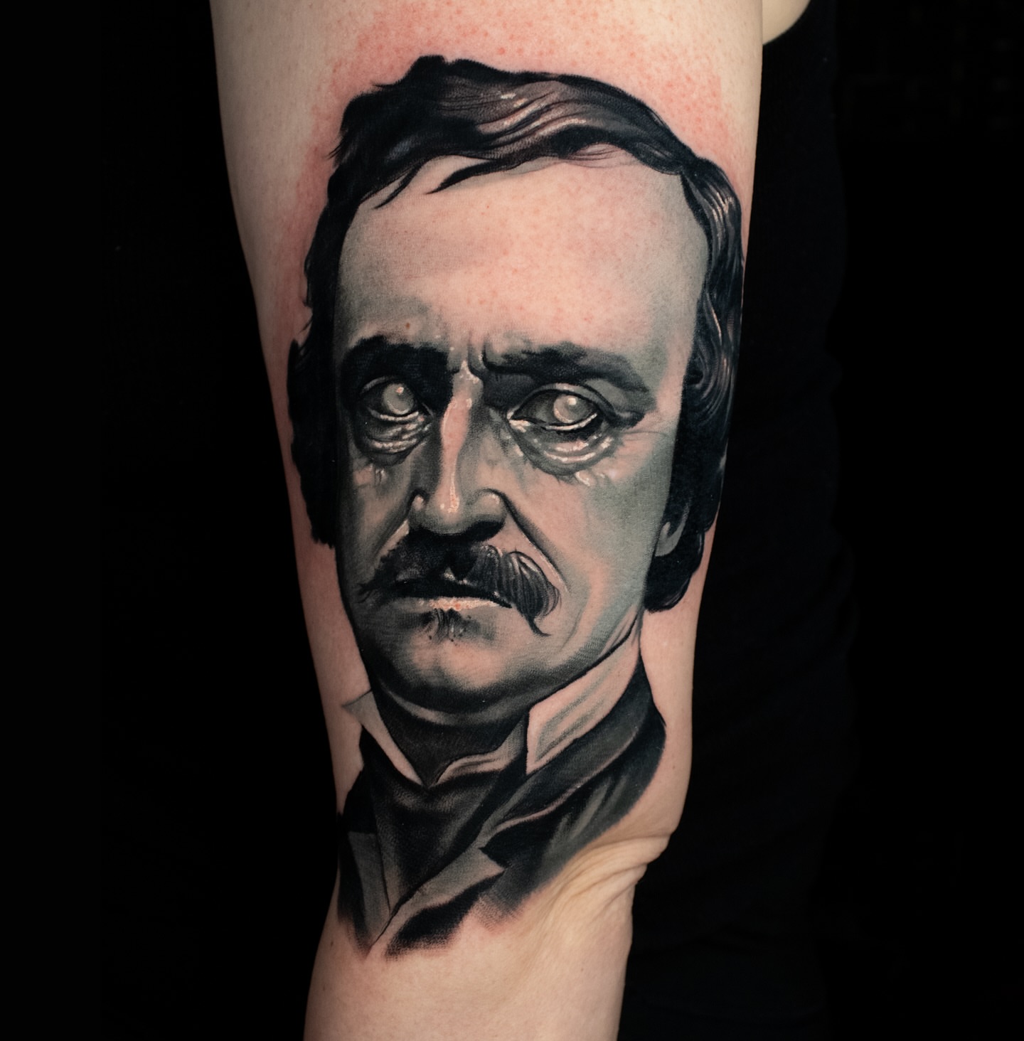 Edgar allan poe realism tattoo on the forearm by Luke Benavidez