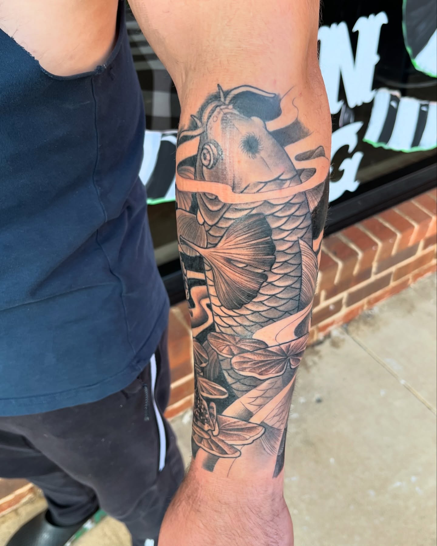 Koi fish japanese irezumi tattoo on the forearm by Angelique Sanders, Tellico Plains, Tennessee