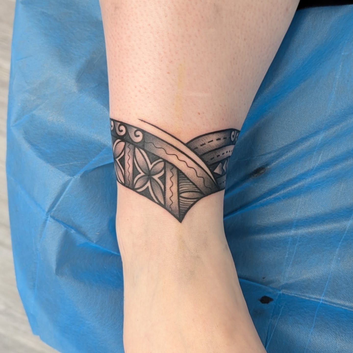 Tribal pattern tribal tattoo on the forearm by Kara Falcon