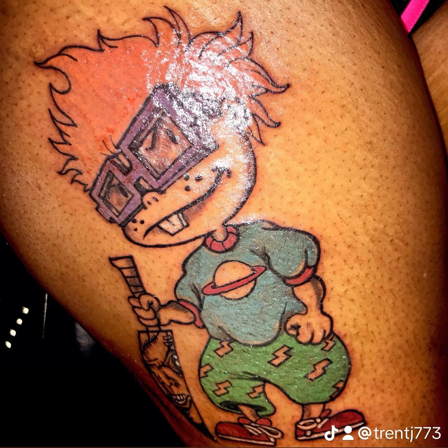 Rugrats new school tattoo on the thigh by Trent Johnson