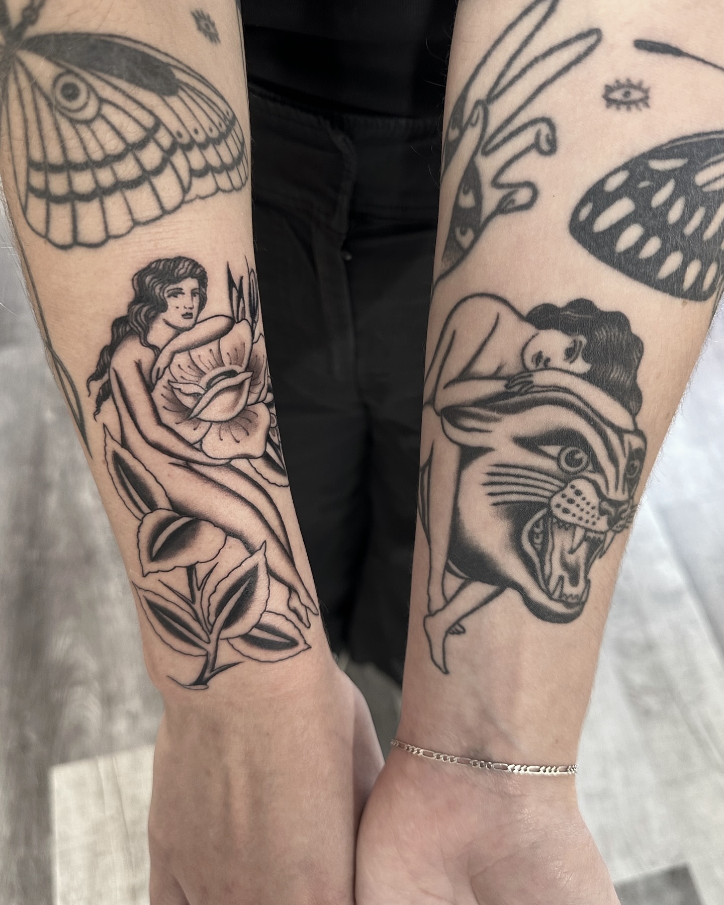 Woman and panther realism tattoo on the forearm by Nicholas Lee, San Francisco, California