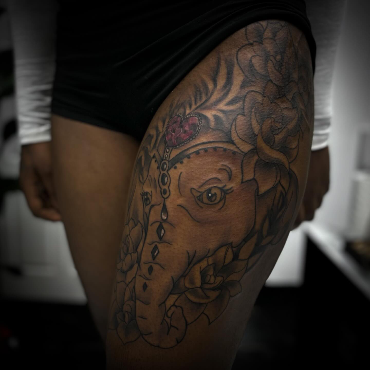 Elephant with floral crown realism tattoo on the thigh by π΅πππππ