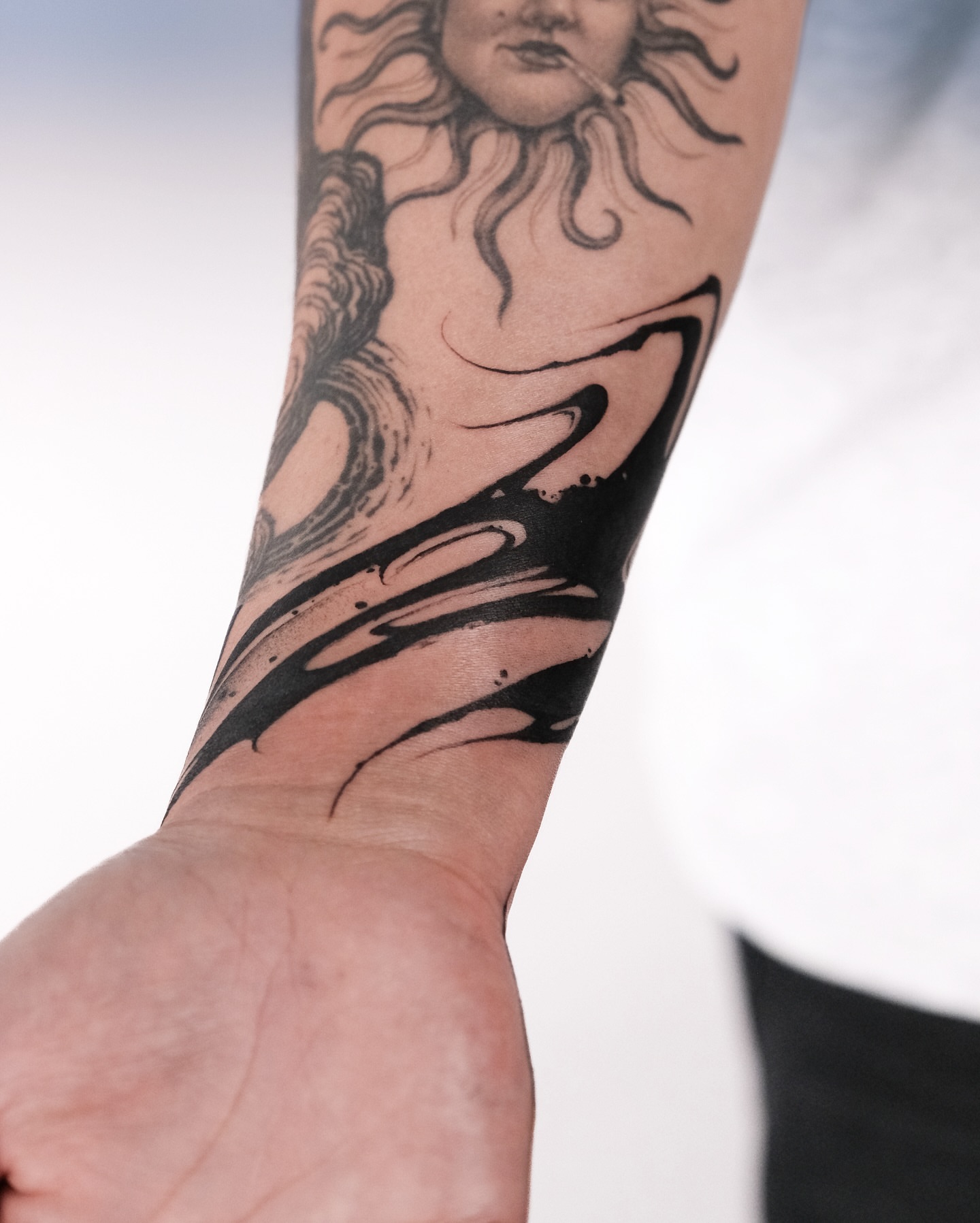 Sun and flames black and grey tattoo on the forearm by Perth tattoo 류, Perth, Western Australia