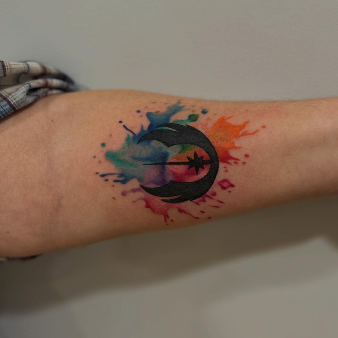 Tattoo by @wattsy.tattoos — watercolor