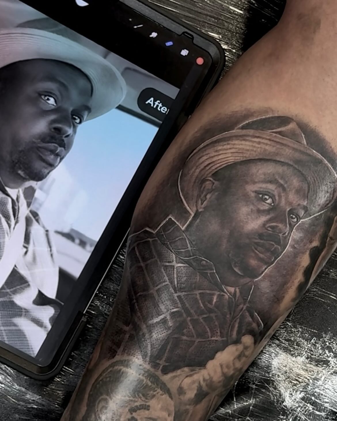 Portrait realism tattoo on the forearm by Tatt2T (T King)
