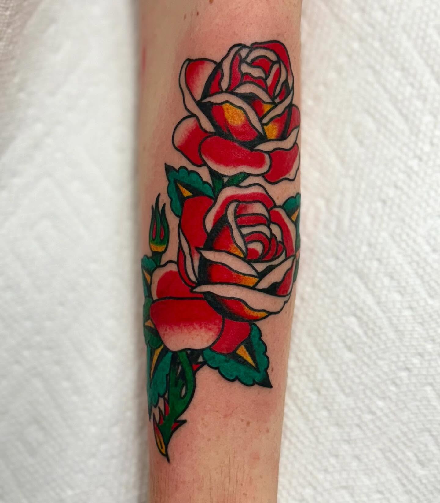 Roses American traditional tattoo on the forearm by Nicholas Mella, Nashville, Tennessee