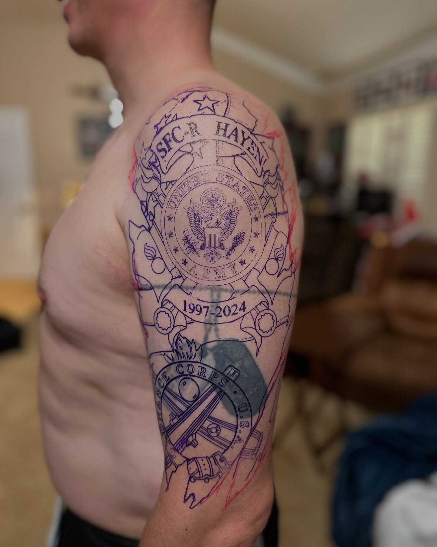 Military insignia American traditional tattoo on the upper arm by 🇵🇭Mark Gaño