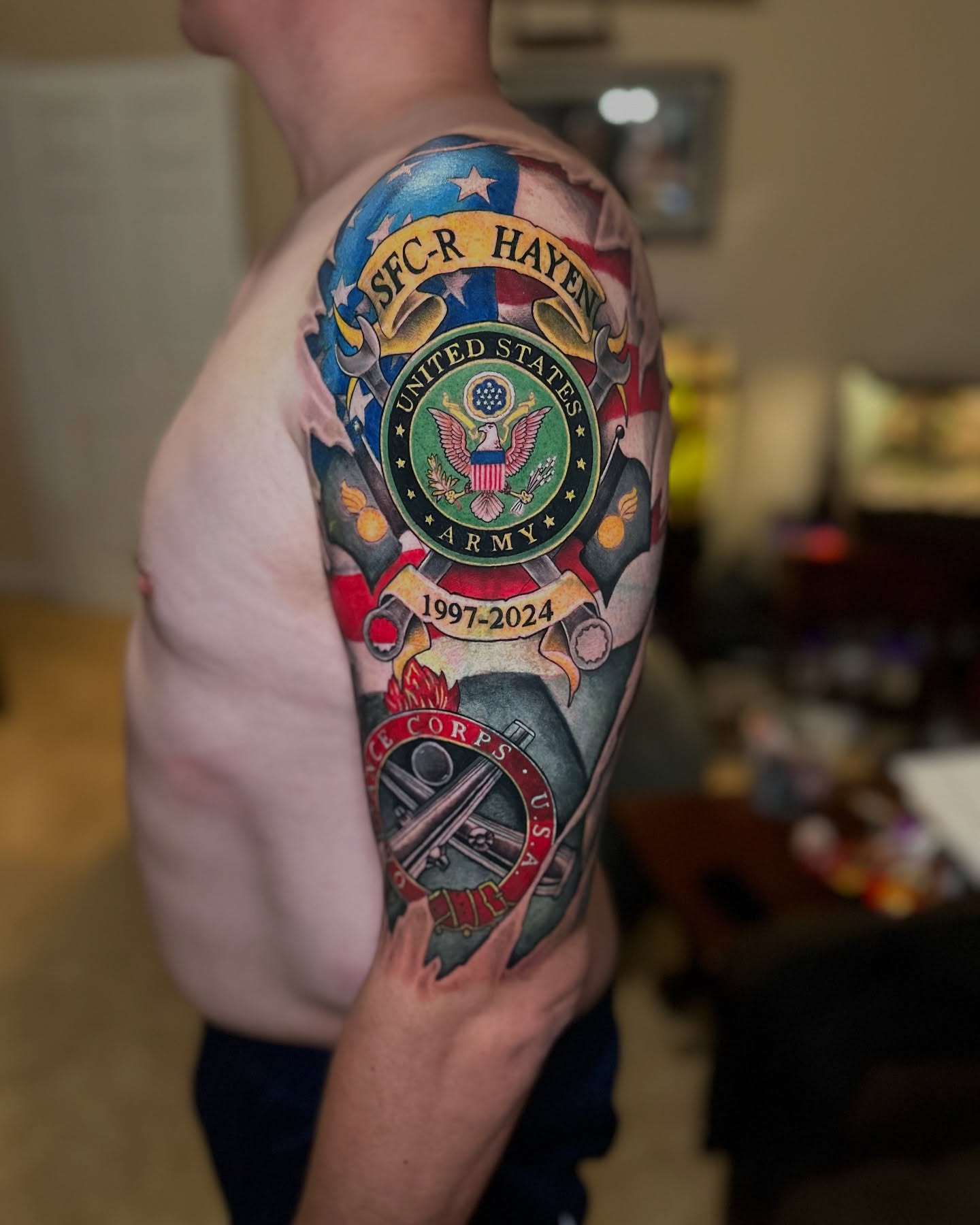 Military insignia American traditional tattoo on the upper arm by 🇵🇭Mark Gaño