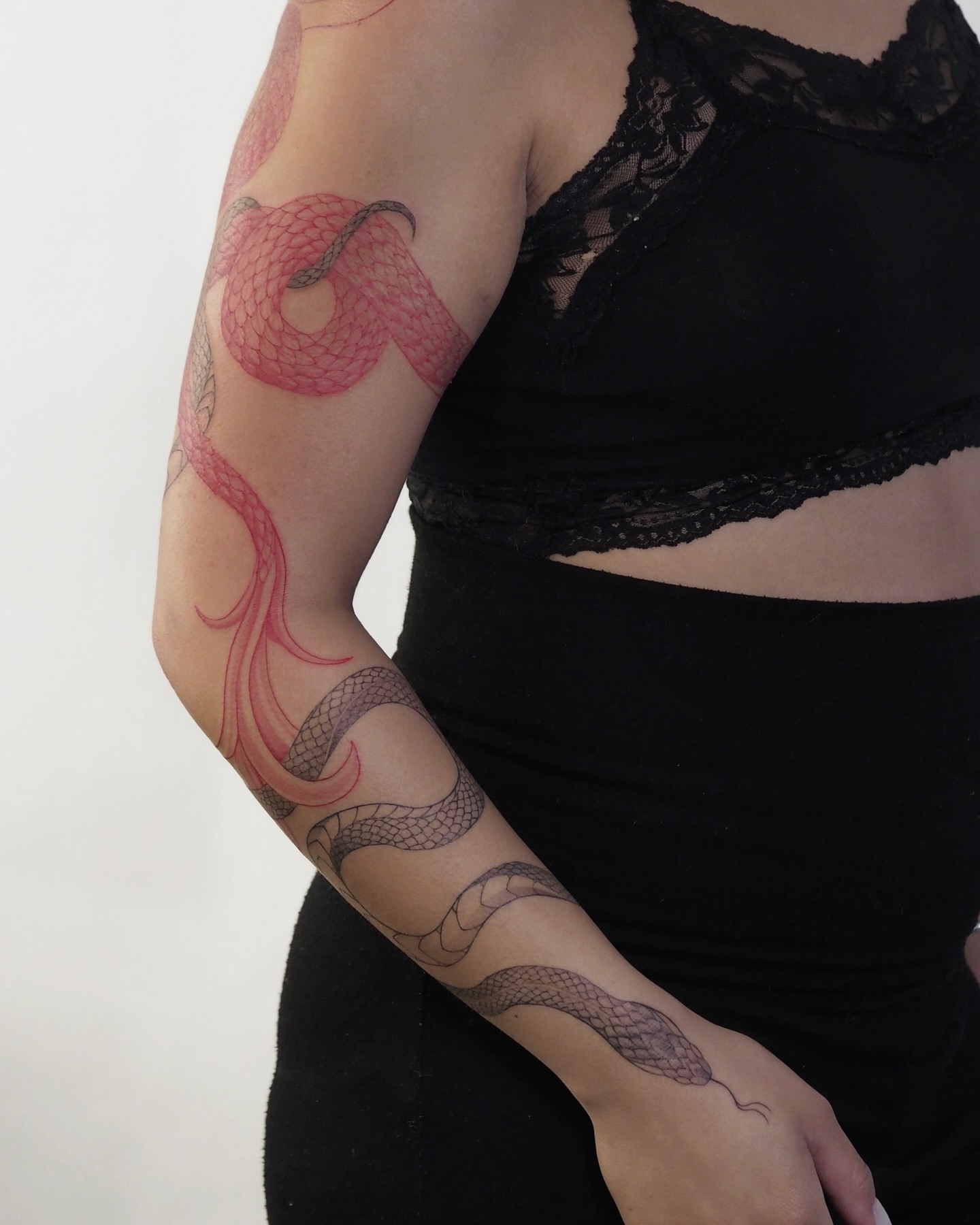 Snake black and grey tattoo on the forearm by Anastasiia Pakhanova ♥ tattoo artist