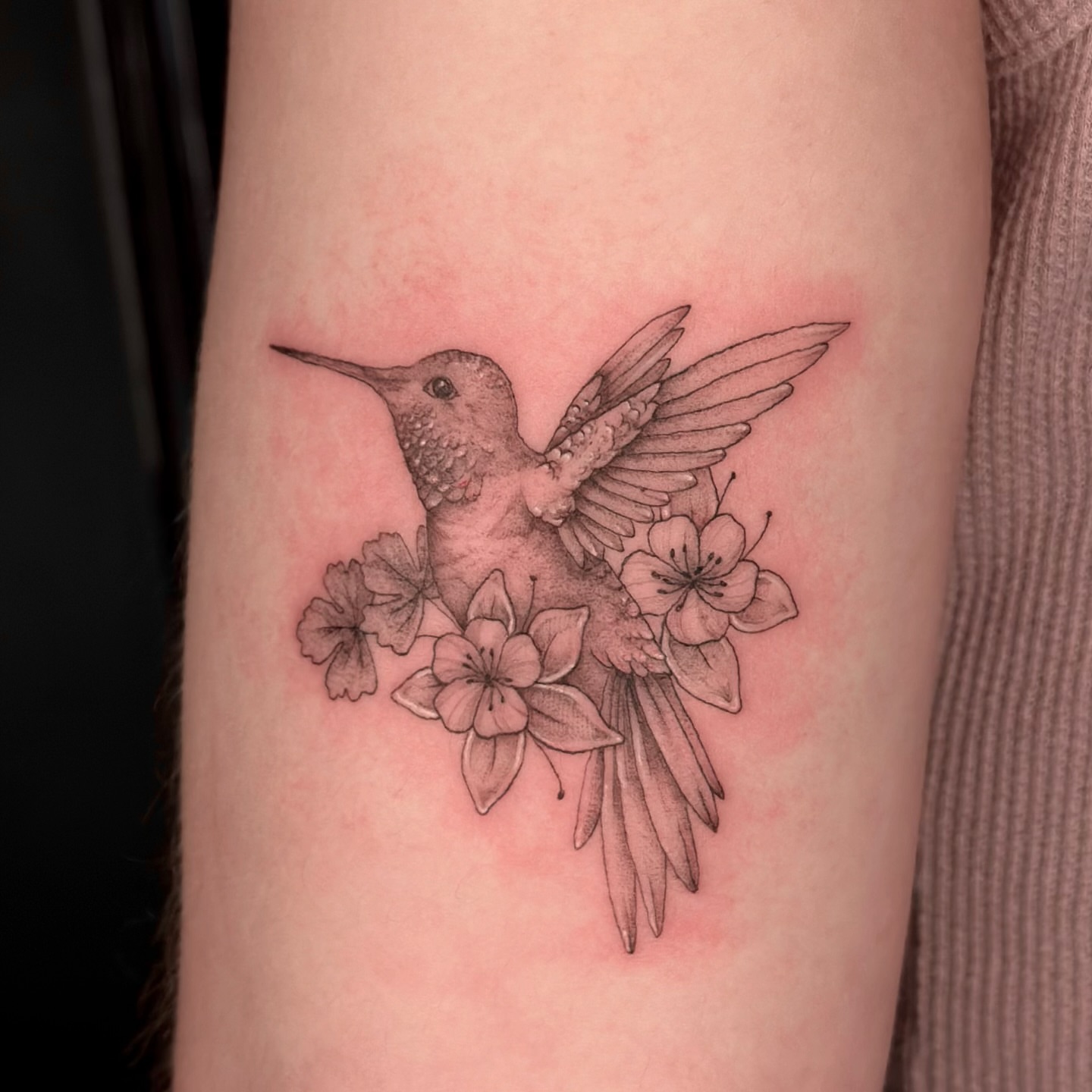 Hummingbird and flowers realism tattoo on the forearm by Sabrina, Harrison, New Jersey