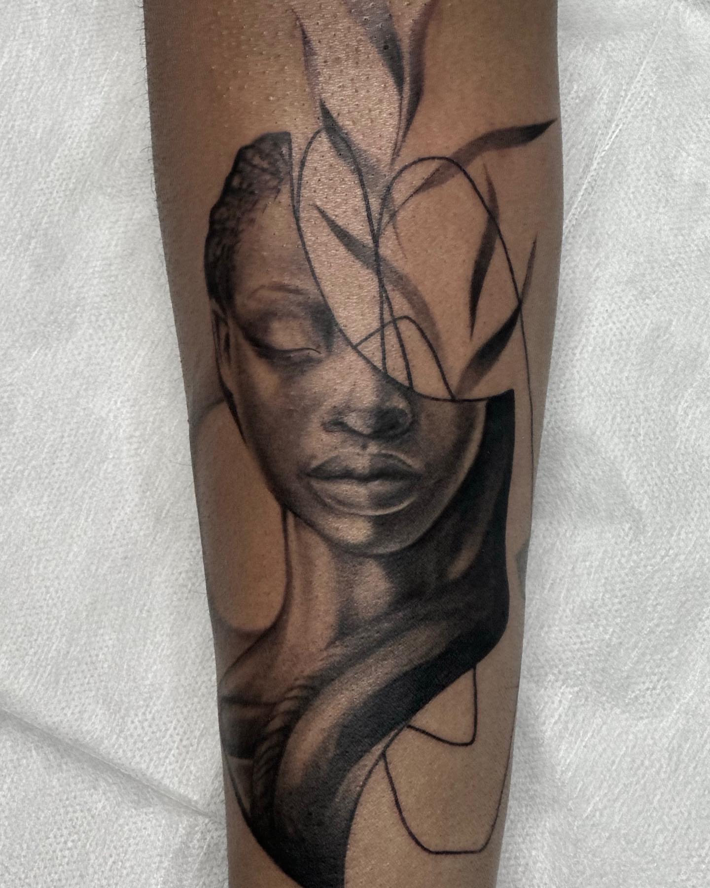 Abstract portrait realism tattoo on the forearm by ❖ Raven Lennox ❖