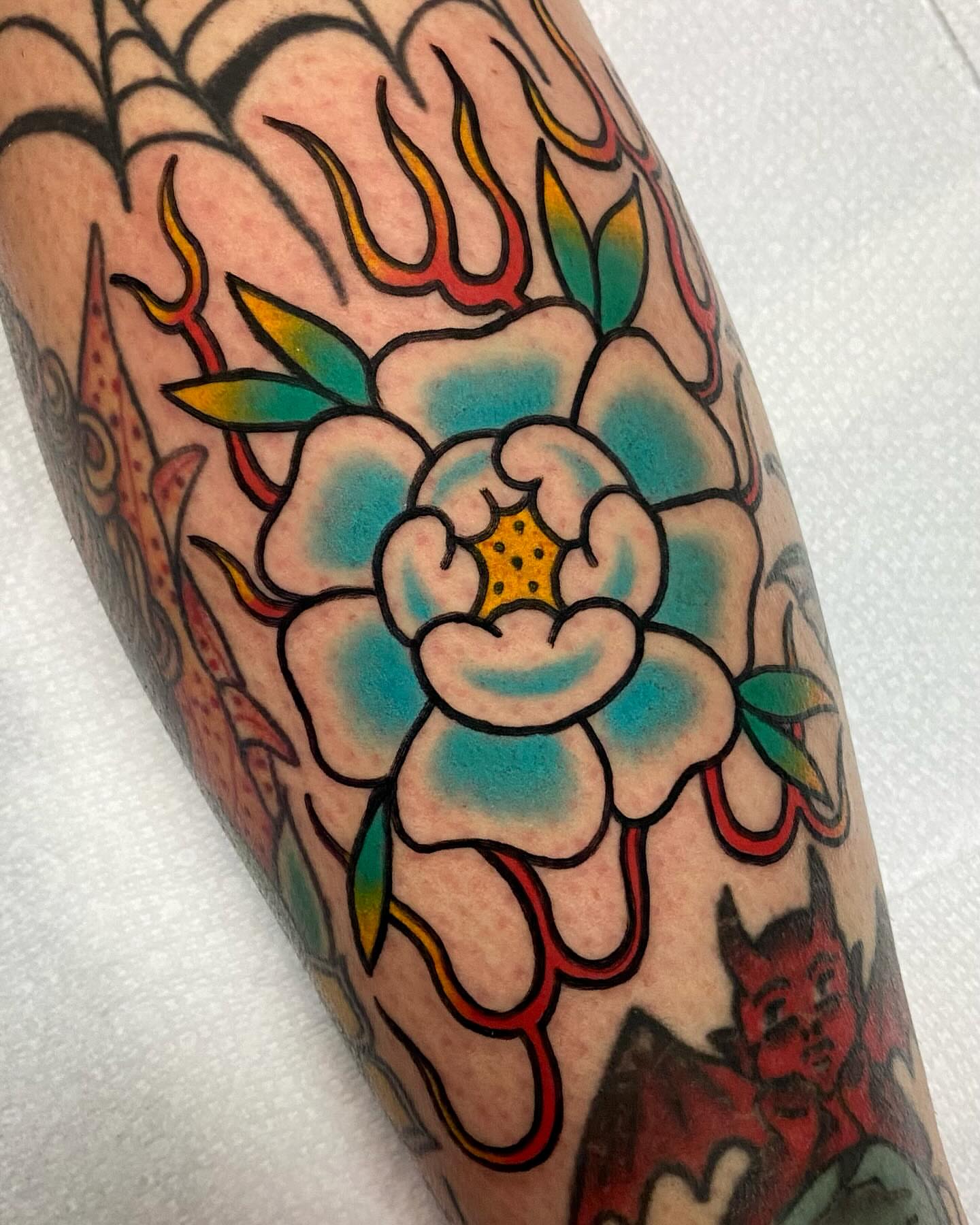Flower American traditional tattoo on the forearm by Shana