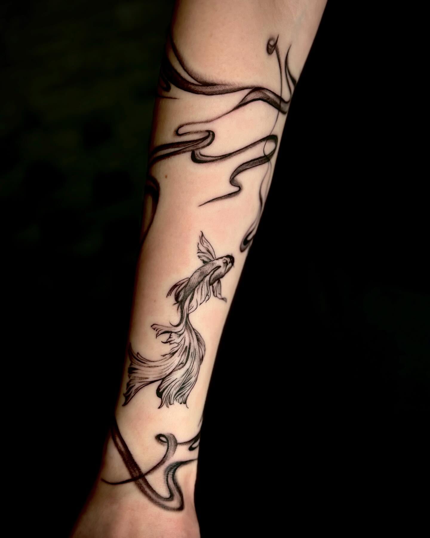 Koi fish black and grey tattoo on the forearm by oh hey, robin.