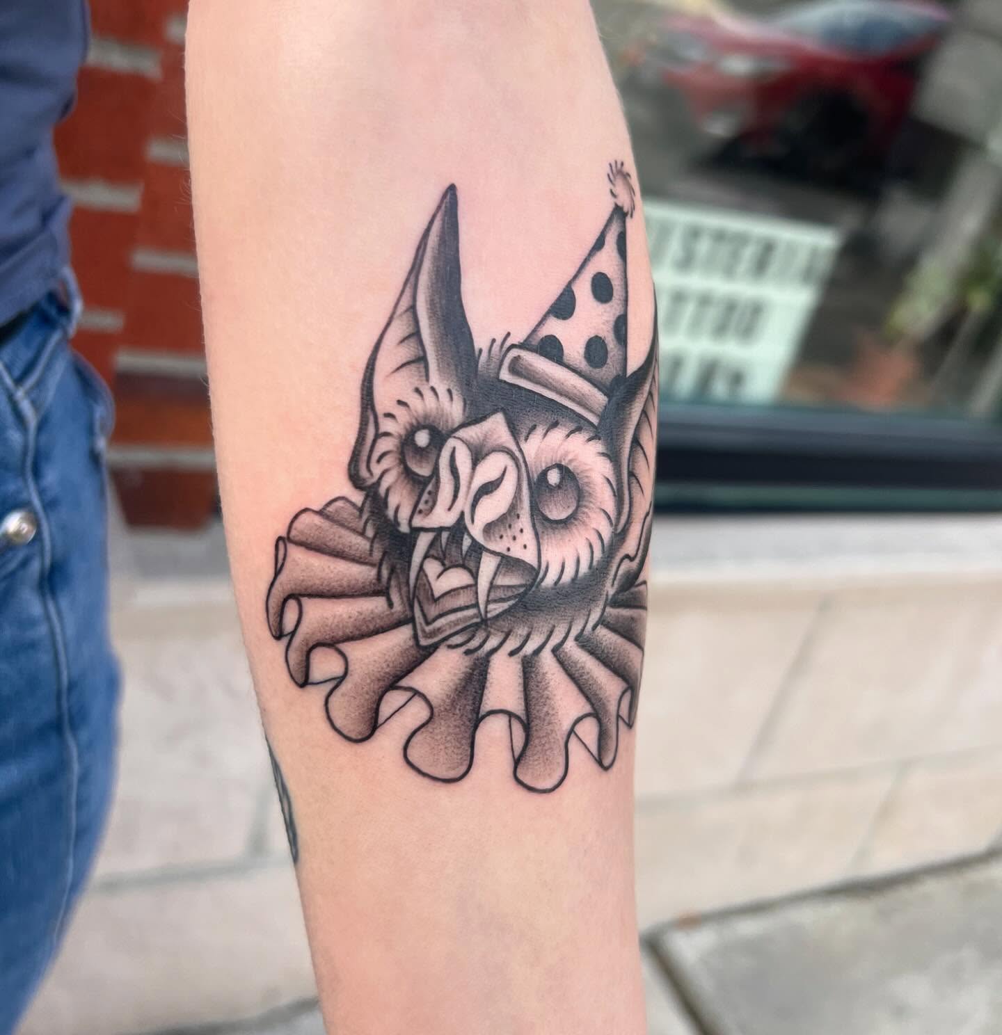 Clown American traditional tattoo on the forearm by Tasha Venola, Bellingham, Washington