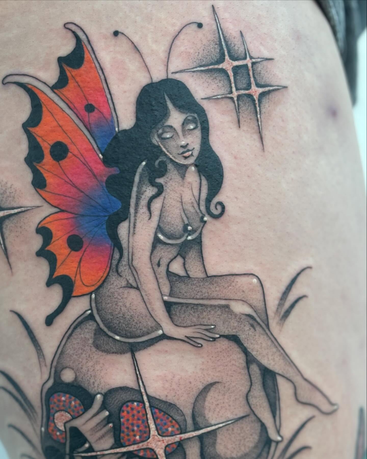 Fairy dotwork tattoo on the thigh by Carly Zehring