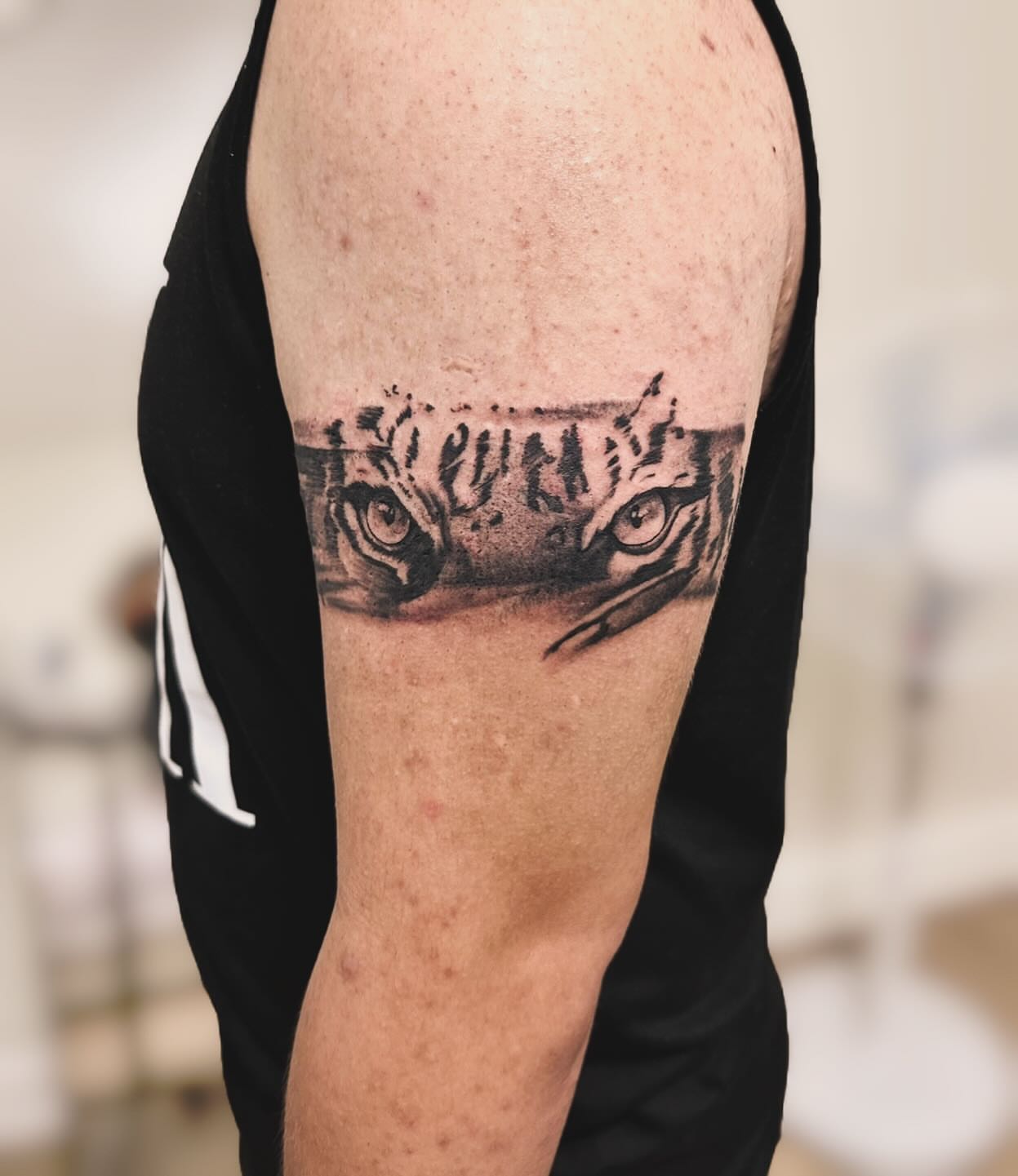 Tiger eyes realism tattoo on the thigh by mia's tattoo, Los Angeles, California