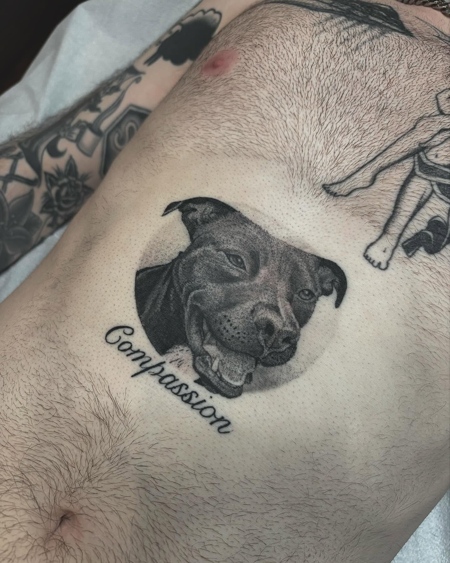 Pit bull dotwork tattoo on the thigh by Jake Hodson, Nashville, Tennessee