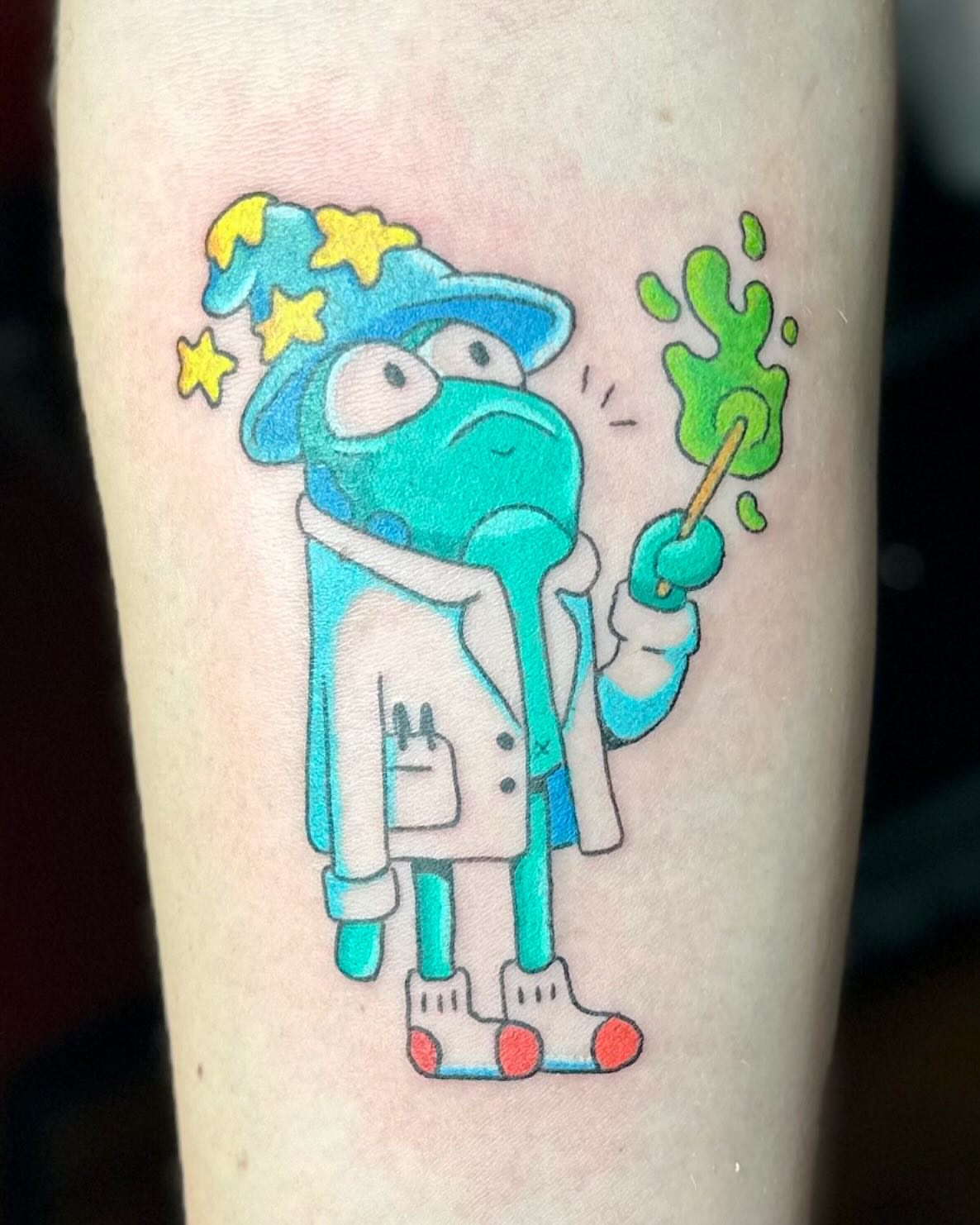 Wizard character illustrative tattoo on the forearm by Kellie Burch