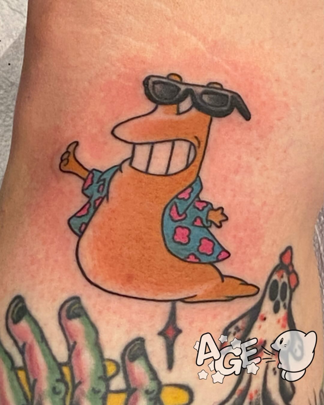 Patrick star new school tattoo on the forearm by Otaku and Gamer Tattooer