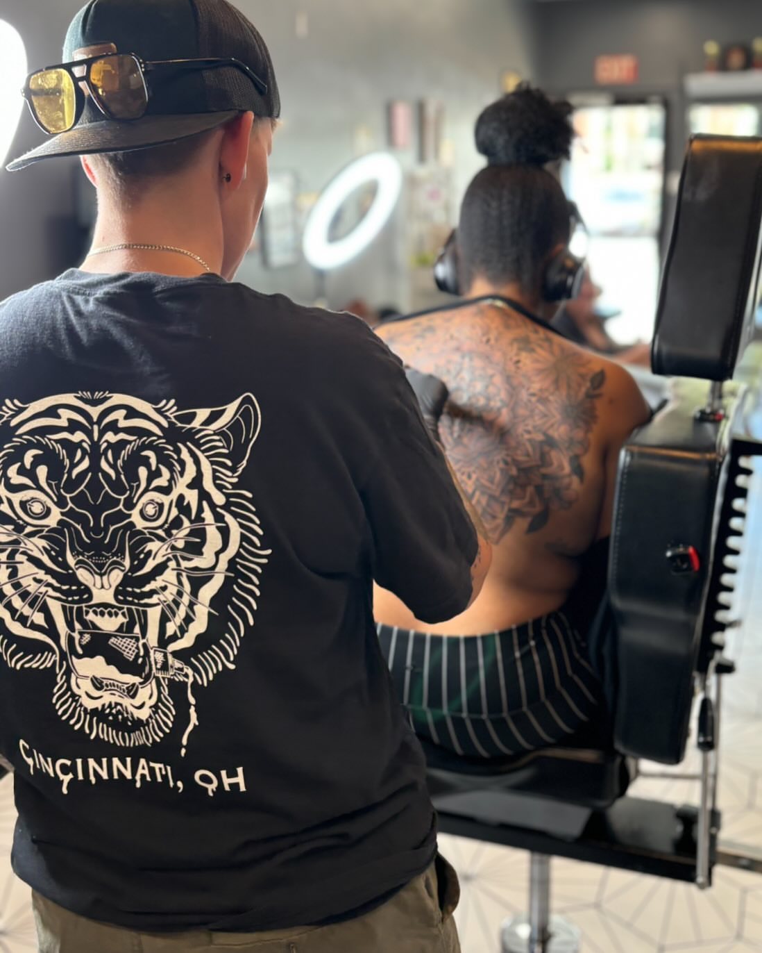 Tiger American traditional tattoo on the back by Taylor Steckman